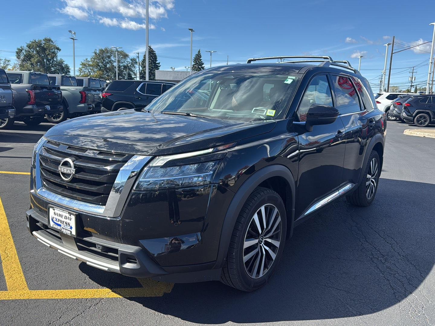 Used 2024 Super Black Nissan Platinum image 7