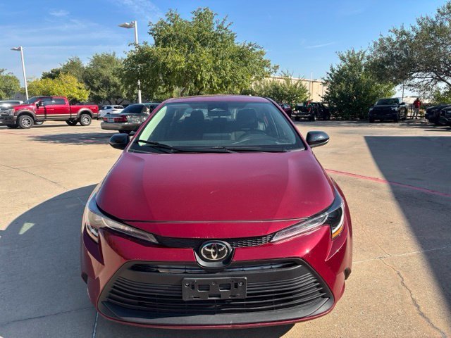 Used 2025 Red Toyota LE image 2