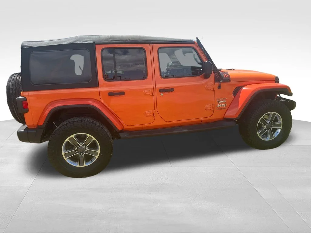 Used 2018 Orange Jeep Unlimited Sahara image 25