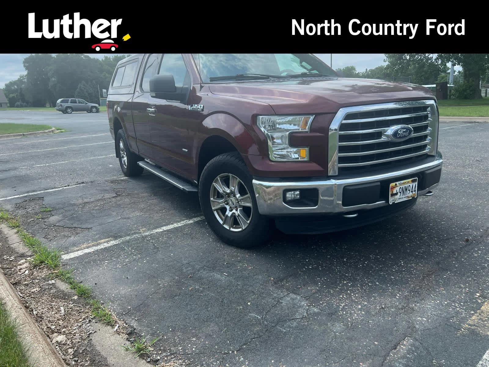 Used 2015 Bronze Fire Metallic Ford XLT image 1