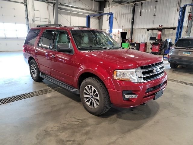 Used 2015 Ruby Red Metallic Ford XLT image 1