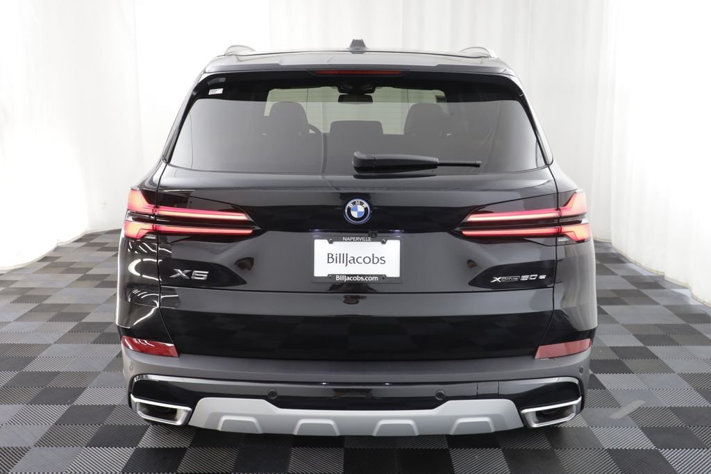 New 2026 Black Sapphire Metallic BMW xDrive50e image 19