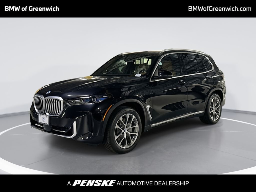 New 2026 Black Sapphire Metallic BMW xDrive50e image 1