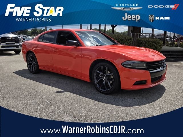 Used 2022 Orange Dodge SXT image 1