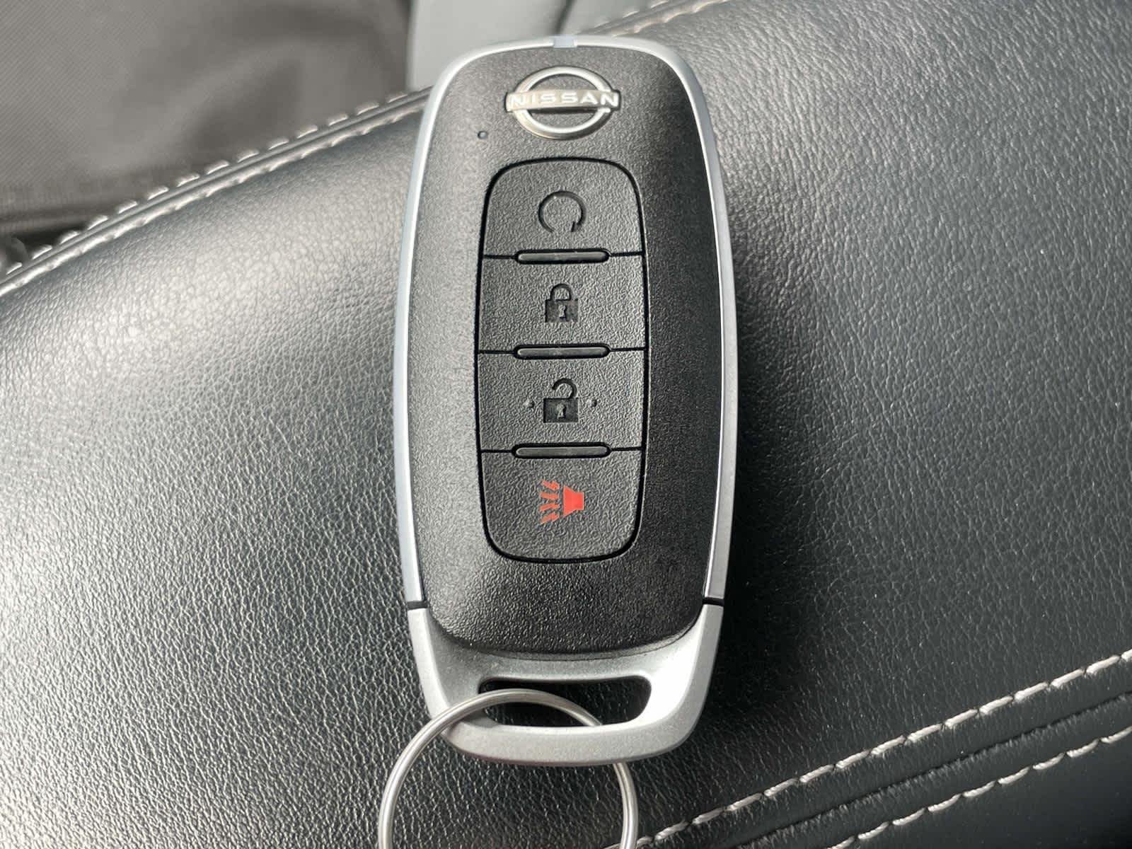Used 2024 Aspen White Tricoat/Super Black Nissan SR image 4