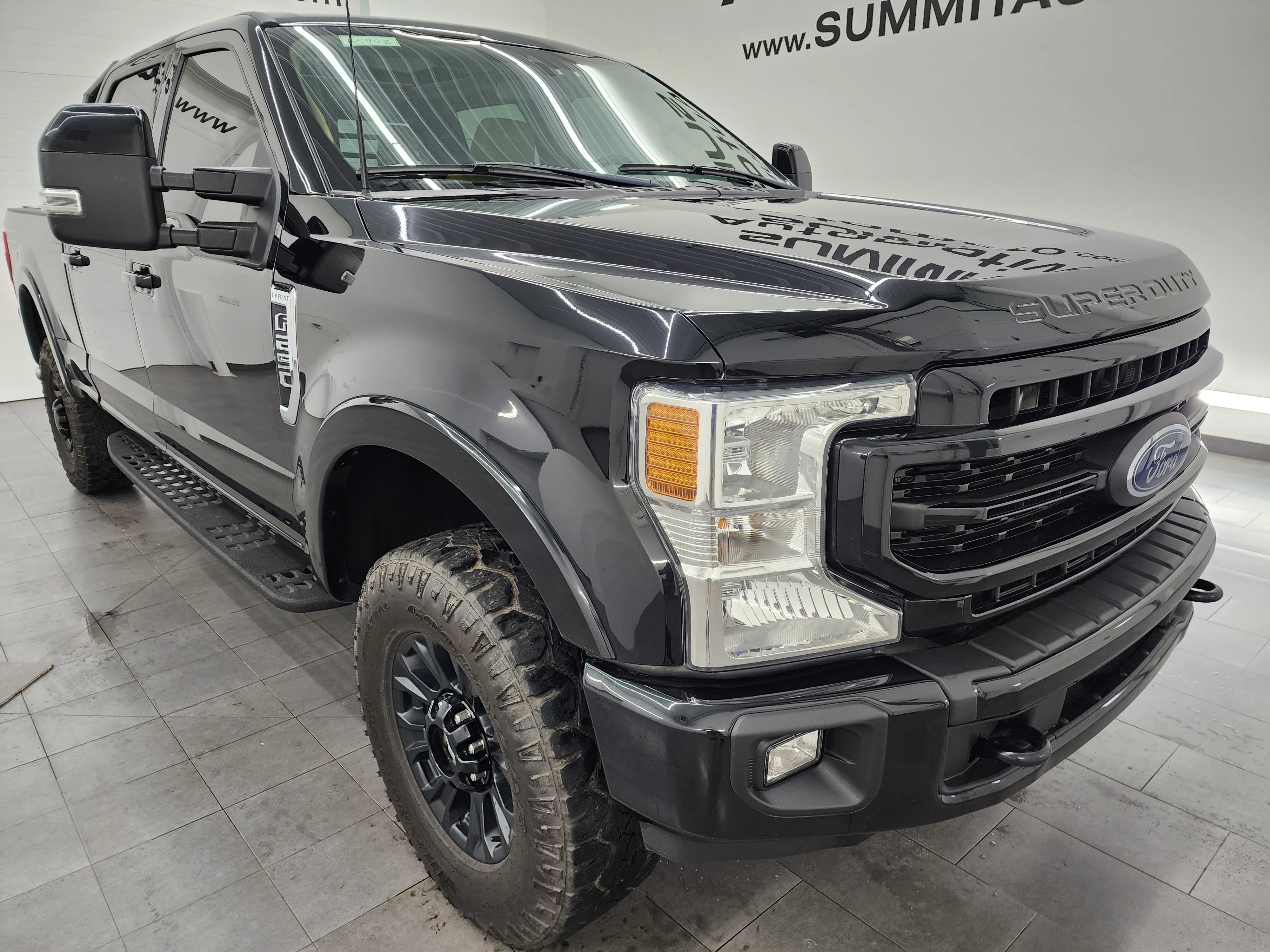 Used 2022 Agate Black Metallic Ford Lariat image 2