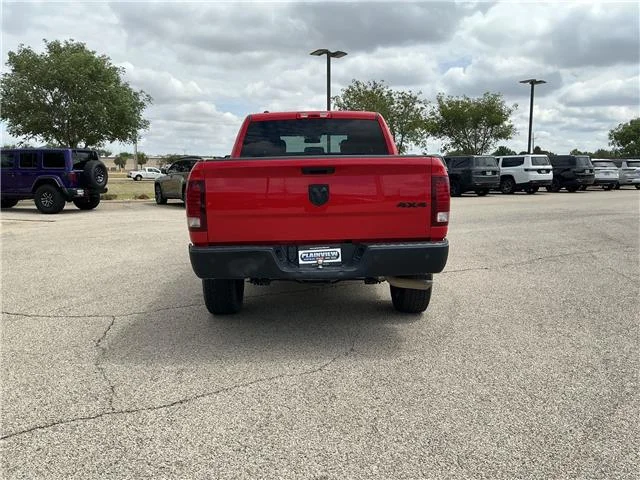 Used 2024 Flame Red Clearcoat RAM SLT 4x4 Crew Cab 5.6 ft. box 140 in. WB image 6