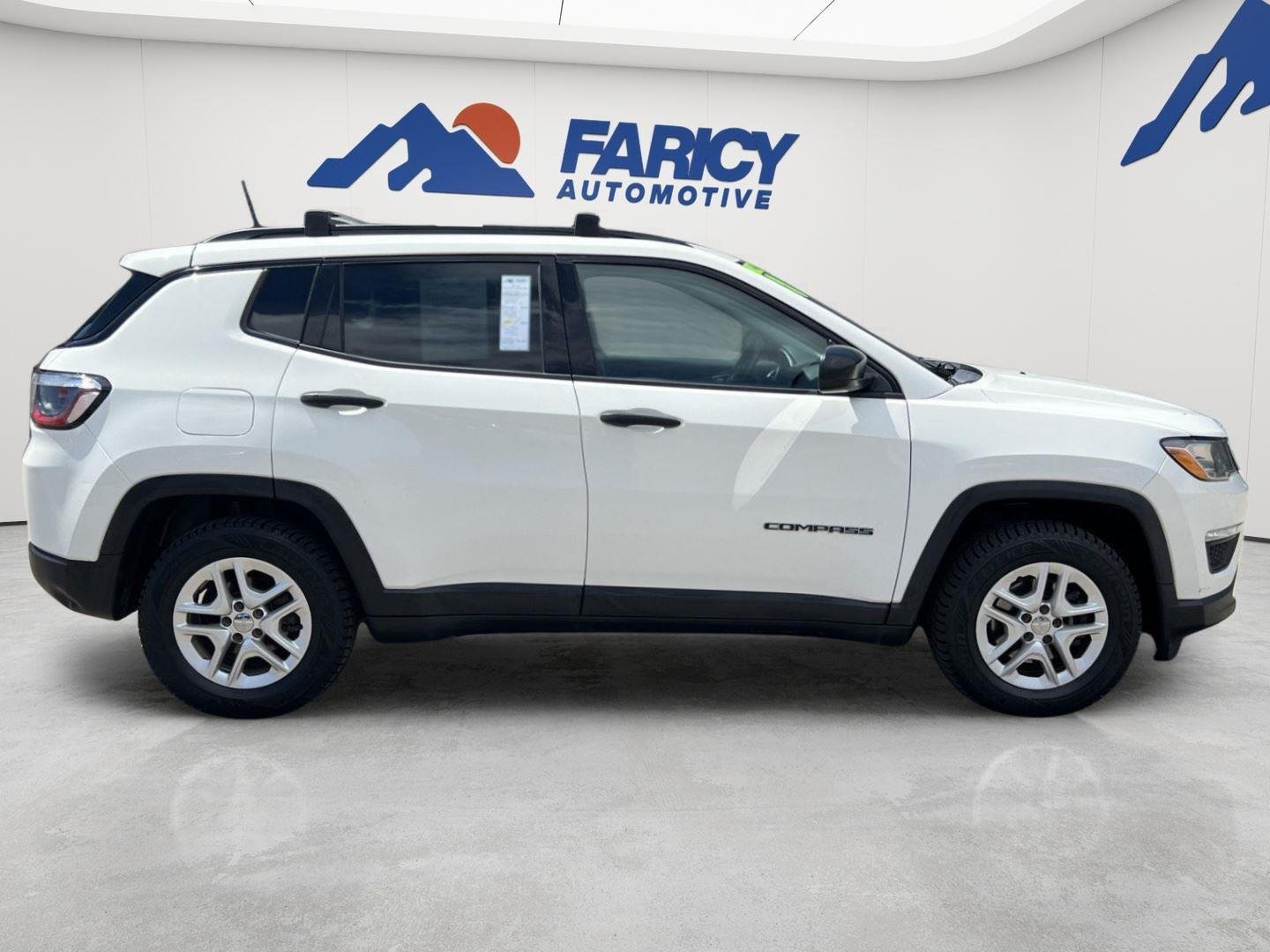 Used 2018 White Clearcoat Jeep Sport image 4