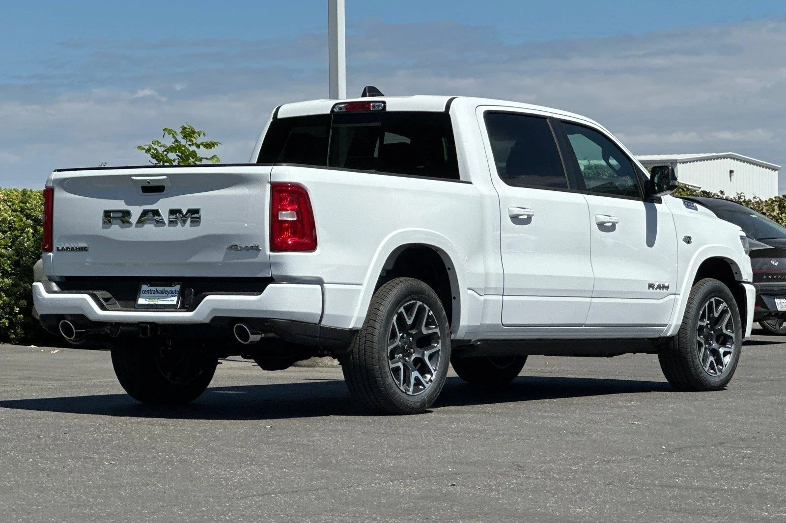 New 2026 Bright White Clear-Coat Exterior Paint RAM Laramie image 3