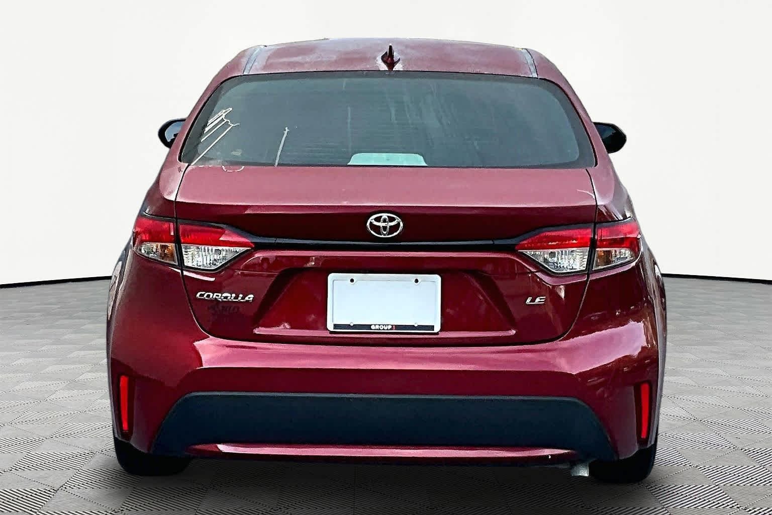 Used 2022 Ruby Flare Pearl Toyota LE image 5