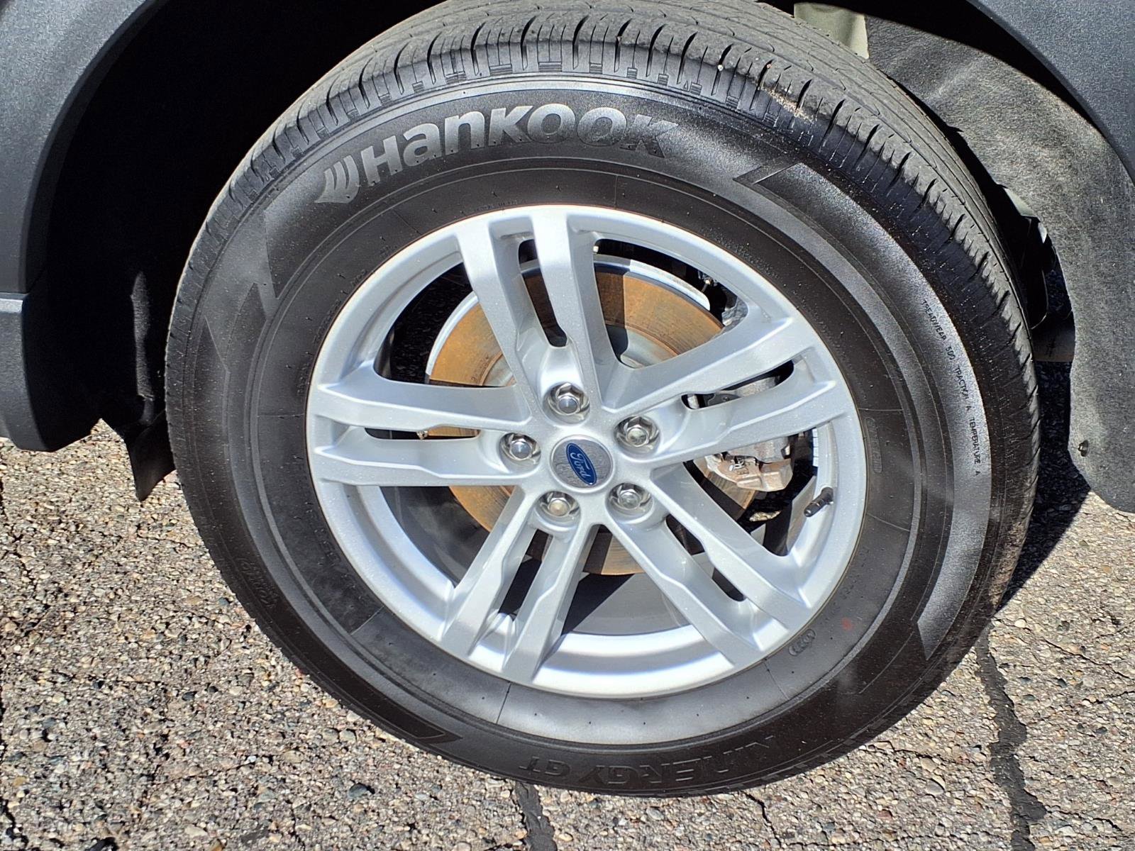 Certified Used 2024 Agate Black Metallic Ford XLT image 33