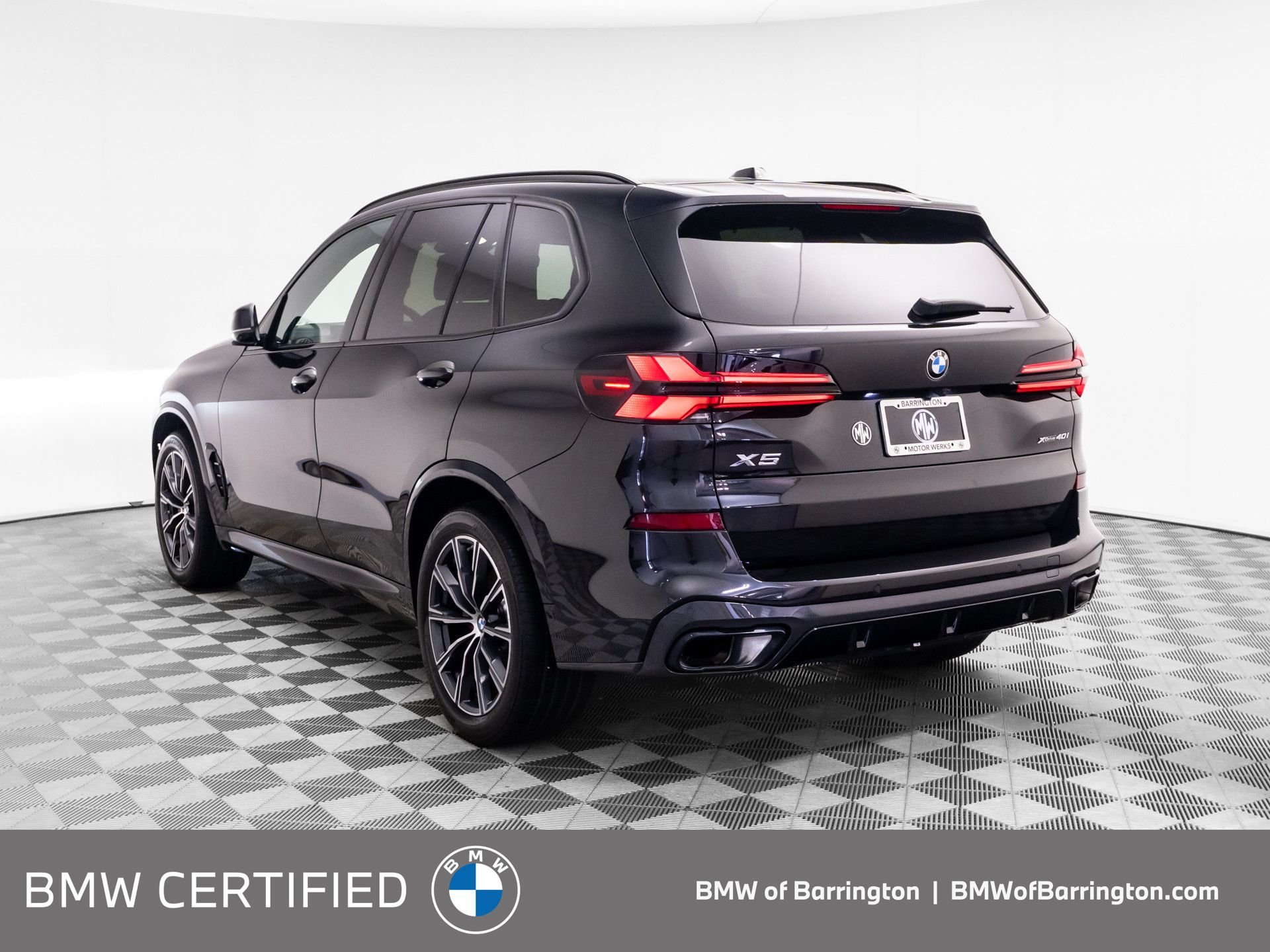 Certified Used 2024 Black Sapphire Metallic BMW xDrive40i image 3