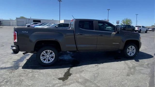 Used 2019 SMOKEY QUARTZ METALLIC GMC 4WD SLE image 9