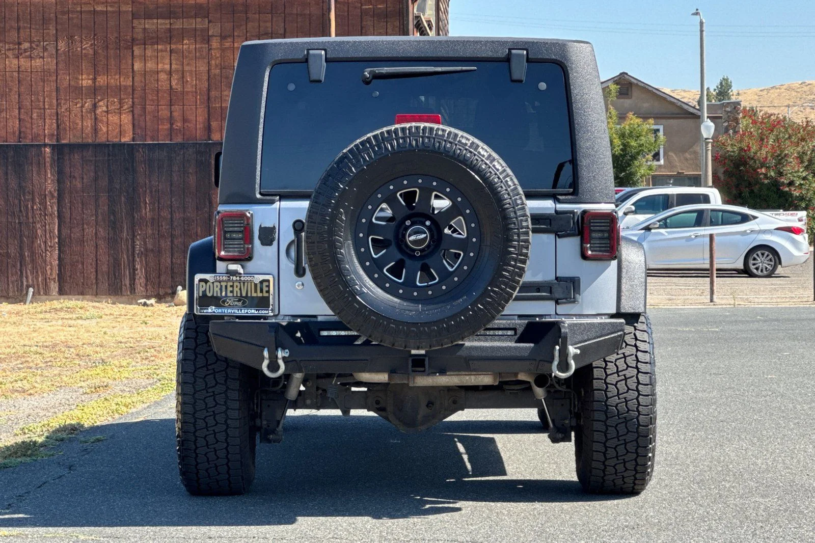 Used 2016 Billet Silver Metallic Clearcoat Jeep Unlimited Sport image 5