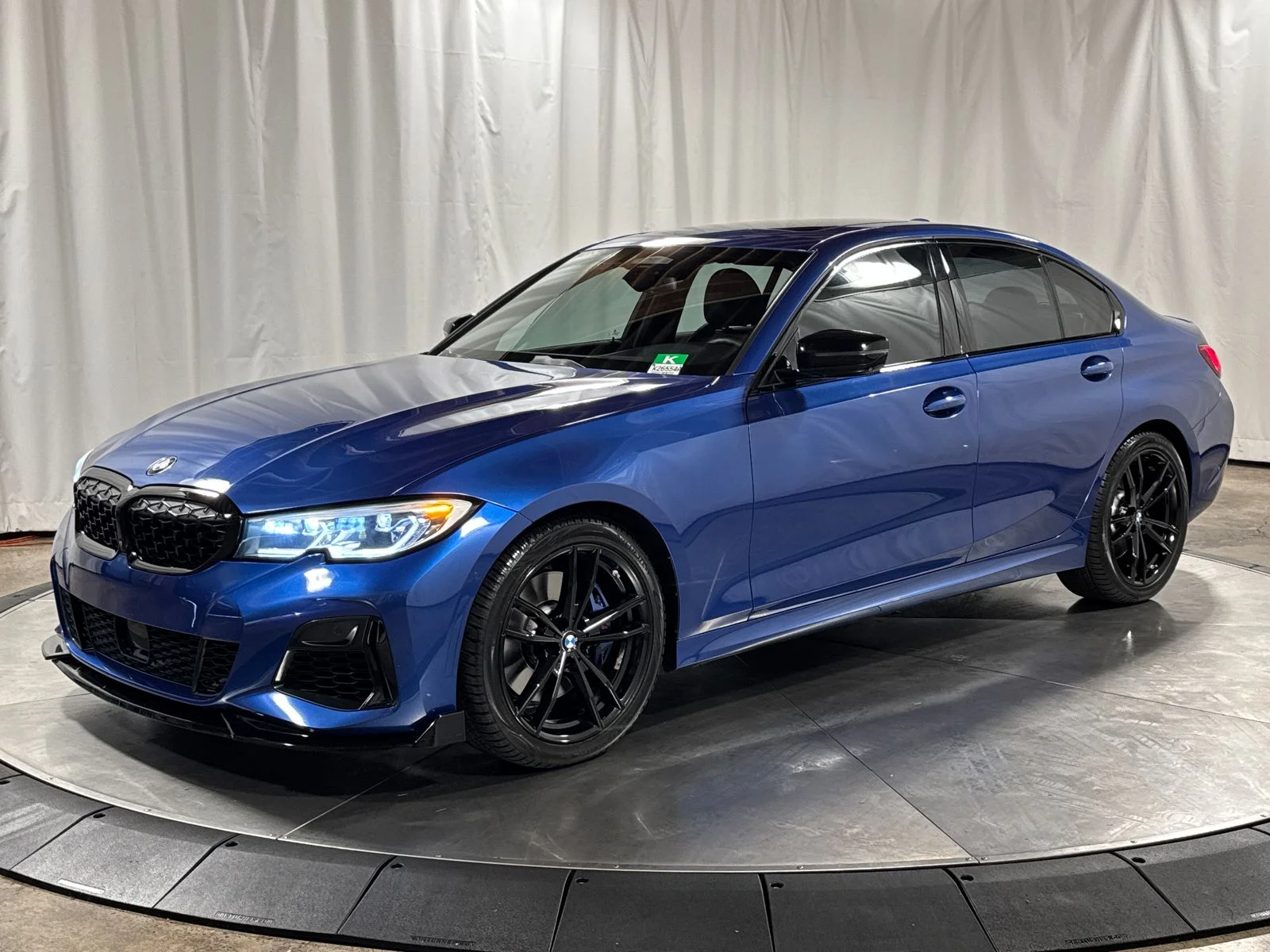 Used 2021 Blue Metallic BMW M340i xDrive image 1
