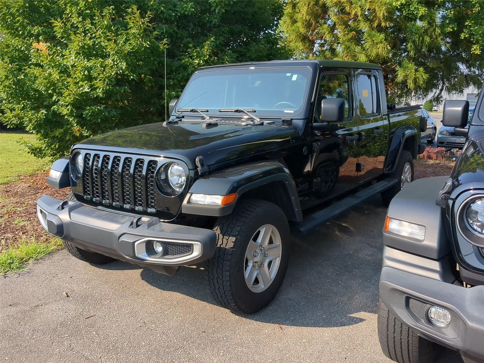 Used 2023 Black Clearcoat Jeep Sport S image 1
