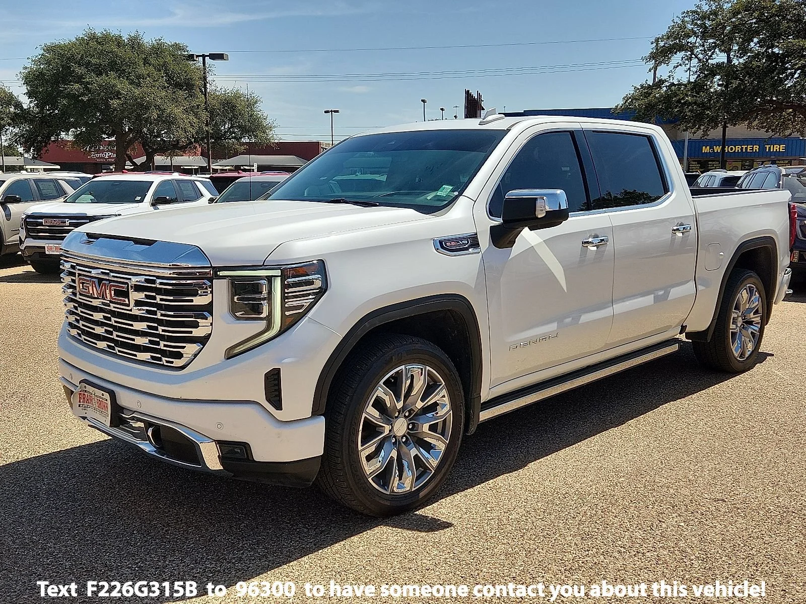 Used 2024 White Frost Tricoat GMC Denali image 1