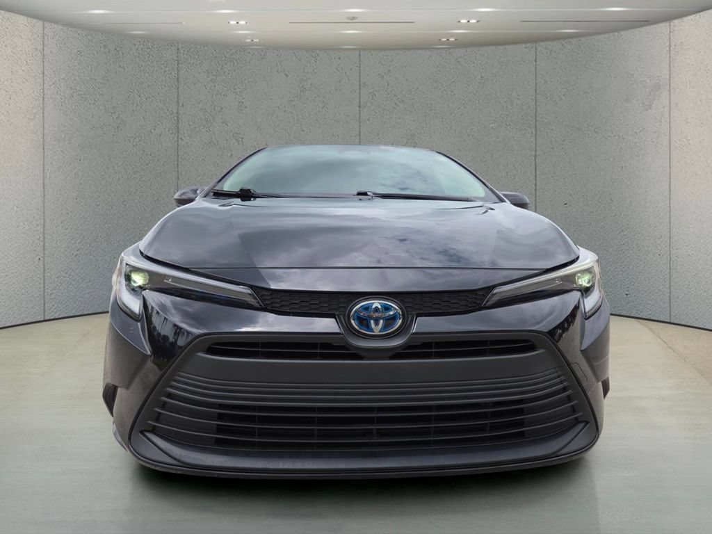 Used 2023 Midnight Black Metallic Toyota Hybrid LE image 12
