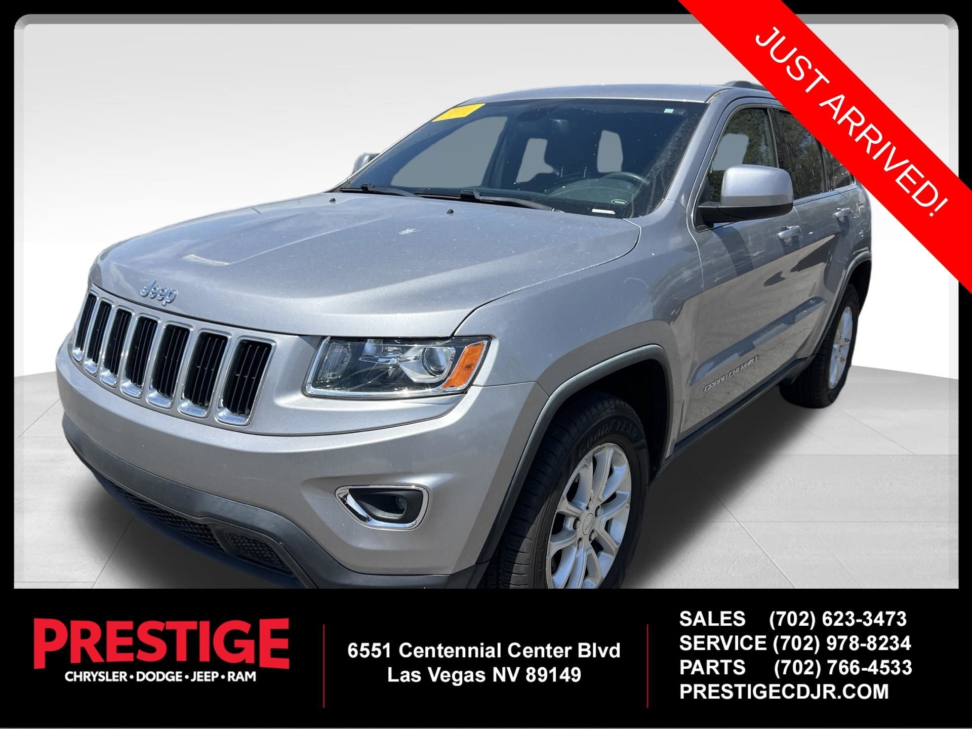 Used 2015 Silver Jeep Laredo image 1