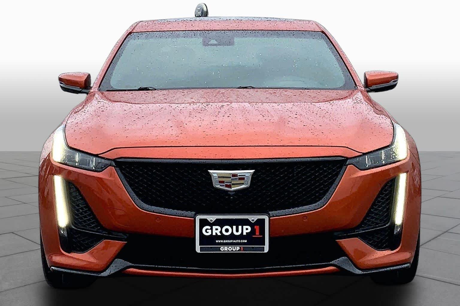 Used 2023 Blaze Orange Metallic Cadillac  image 4