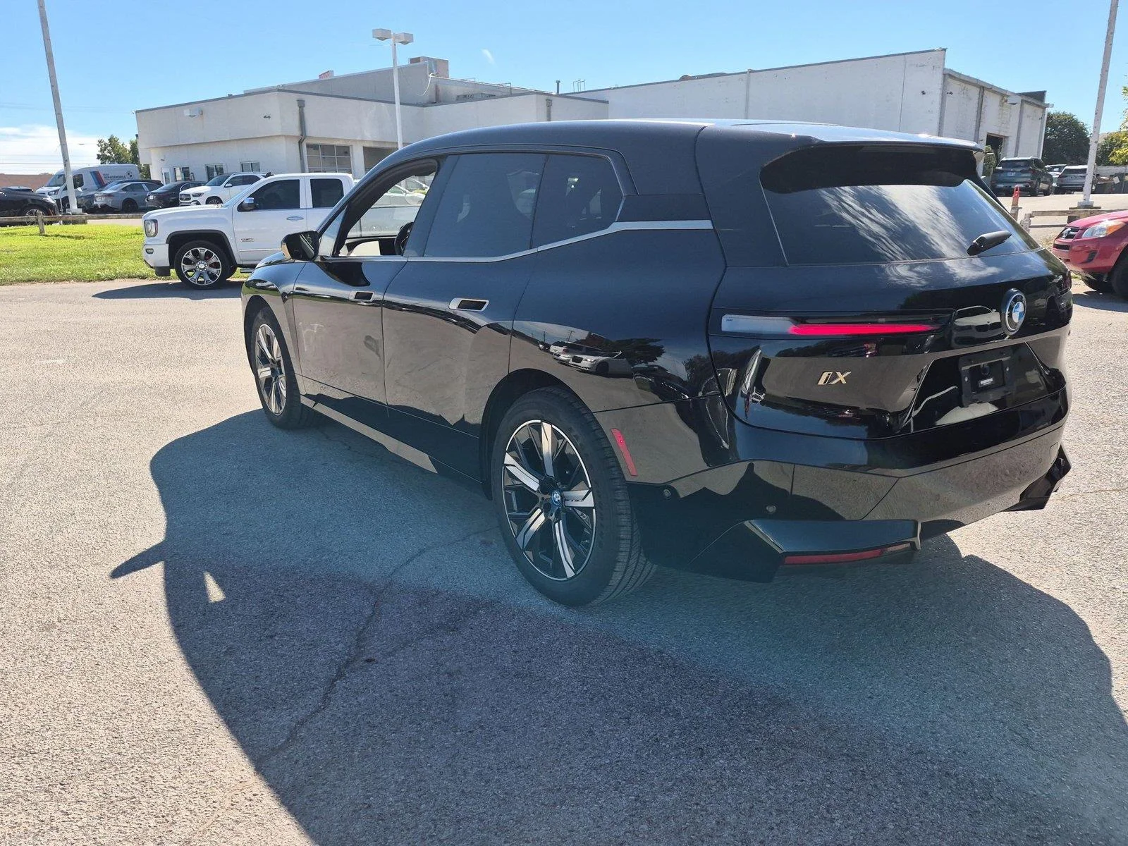 Used 2024 Black Sapphire Metallic BMW xDrive50 image 3