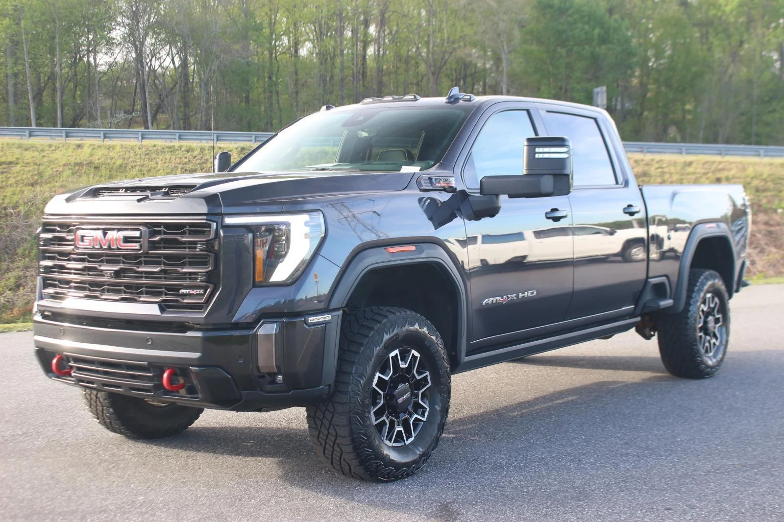 Used 2024 Titanium Rush Metallic GMC AT4X image 3