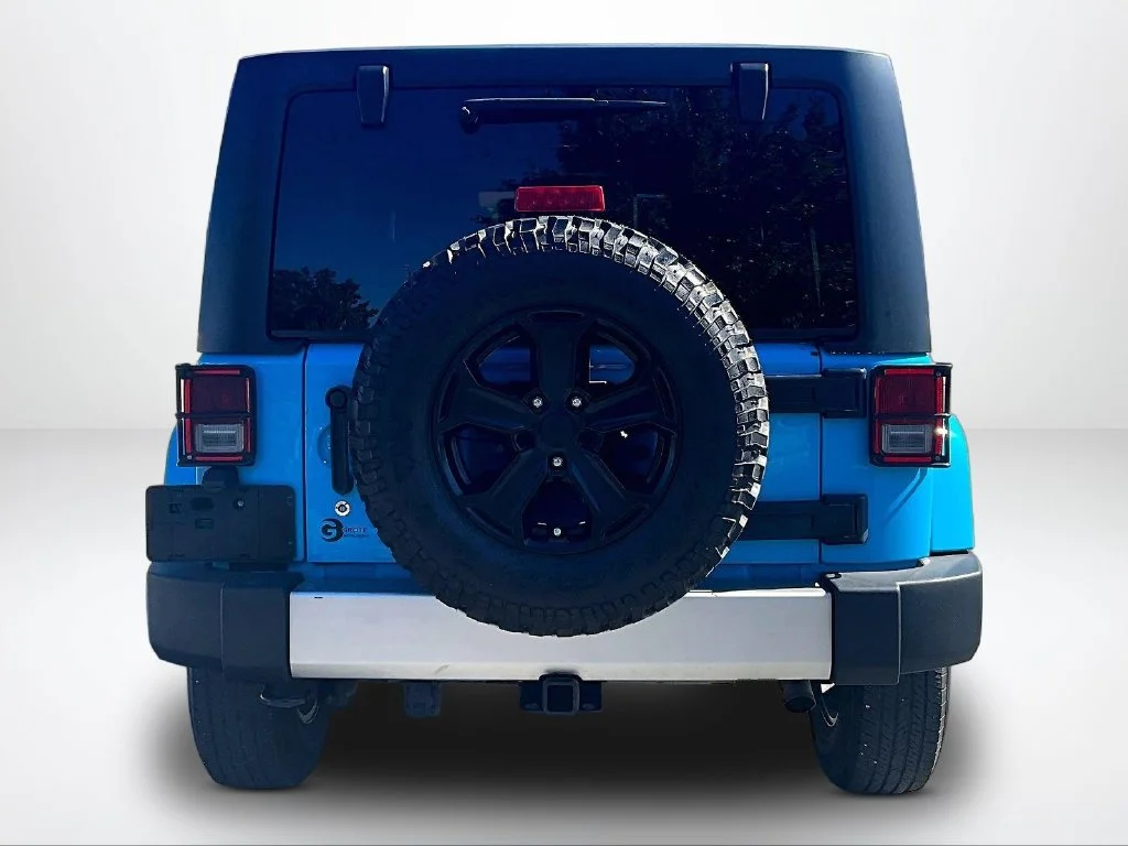 Used 2017 Blue Jeep Unlimited Sahara image 5