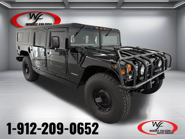 Used 1996 Black AM General 4-PASSENGER WGN image 1