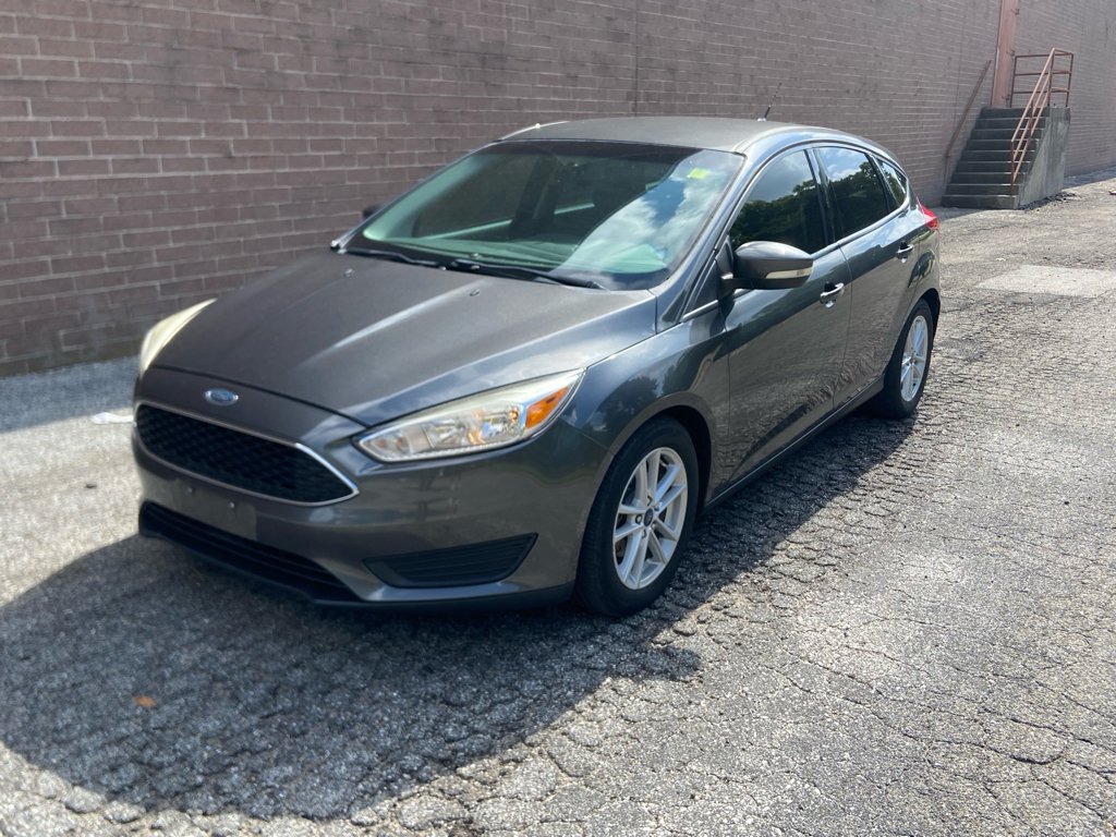 Used 2017 Magnetic Metallic Ford SE image 1