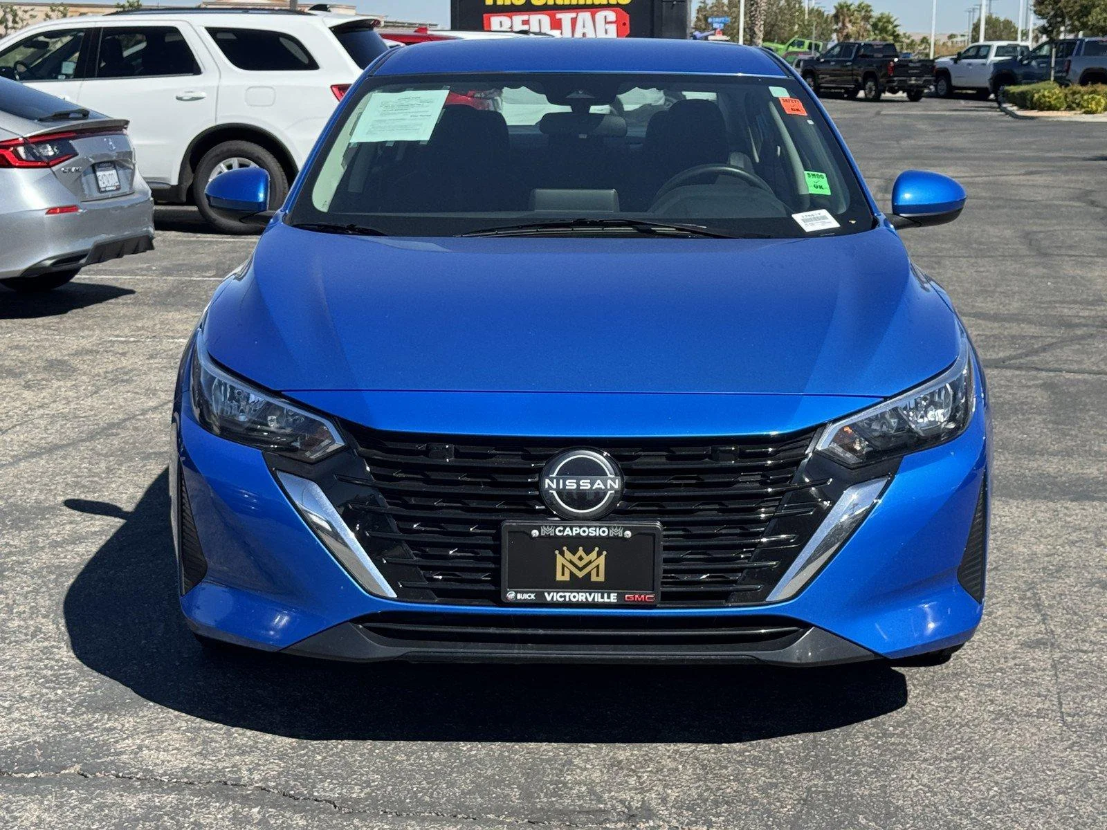 Used 2024 Electric Blue Met Nissan SV image 2