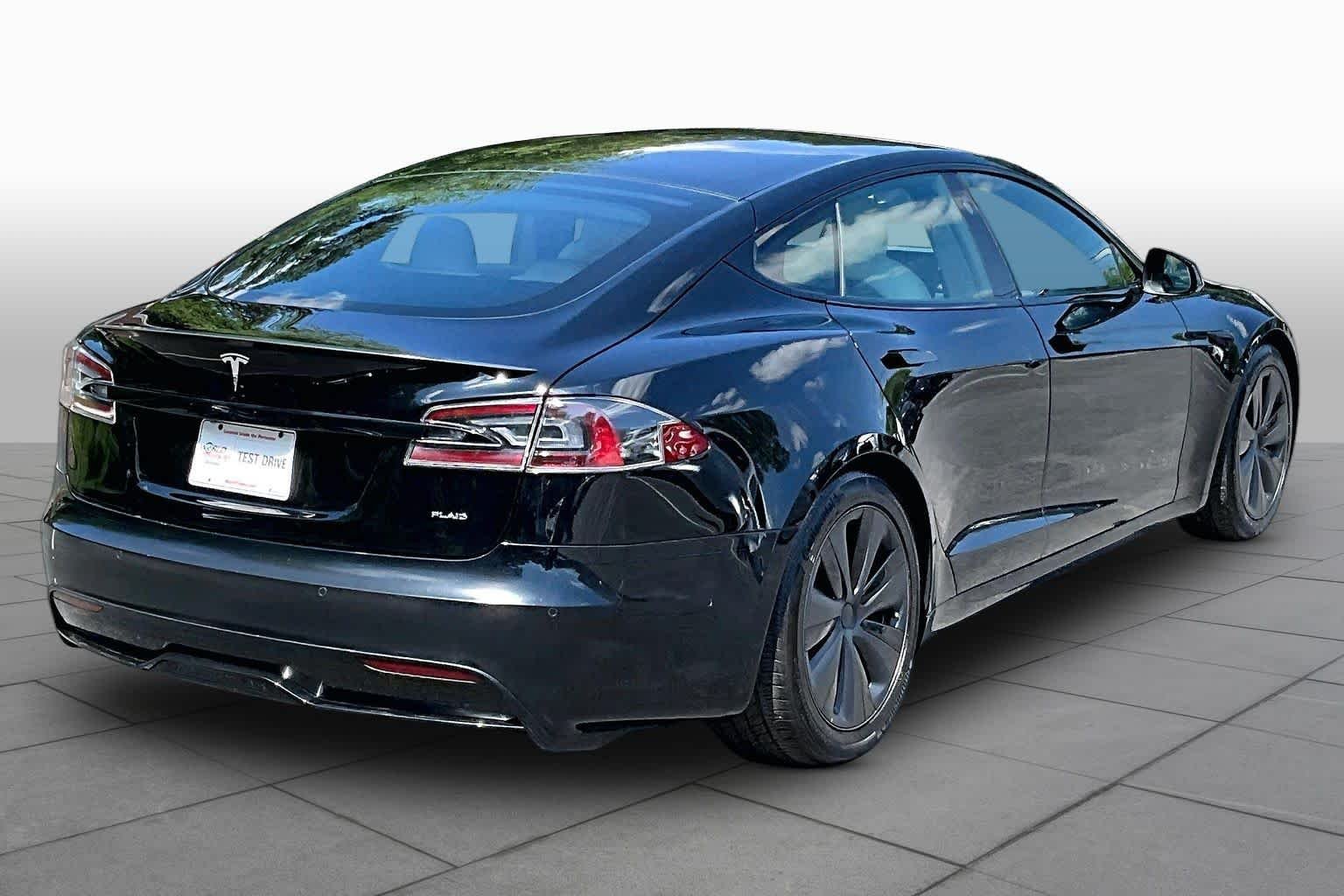 Used 2021 Solid Black Tesla Plaid image 12
