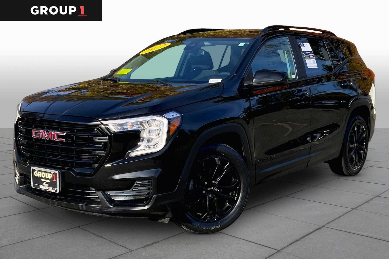 Used 2022 Ebony Twilight Metallic GMC SLE image 1