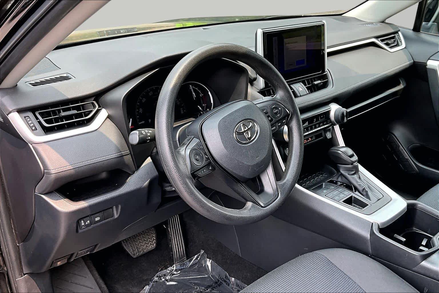 Used 2023 Midnight Black Metallic Toyota LE image 17