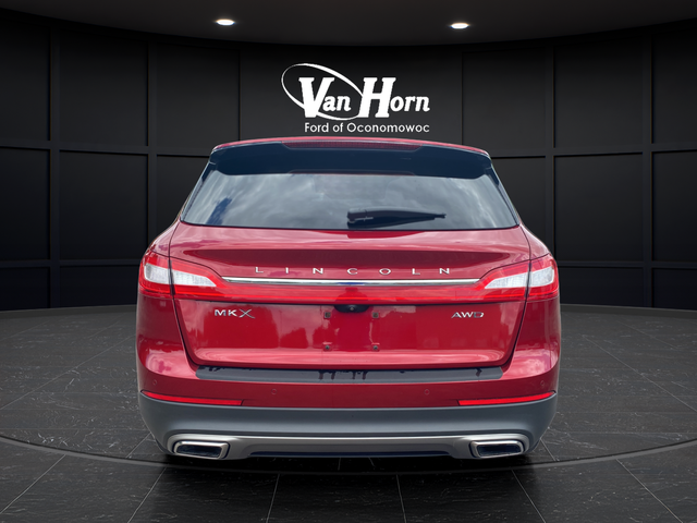 Used 2016 Ruby Red Metallic Lincoln Reserve image 6