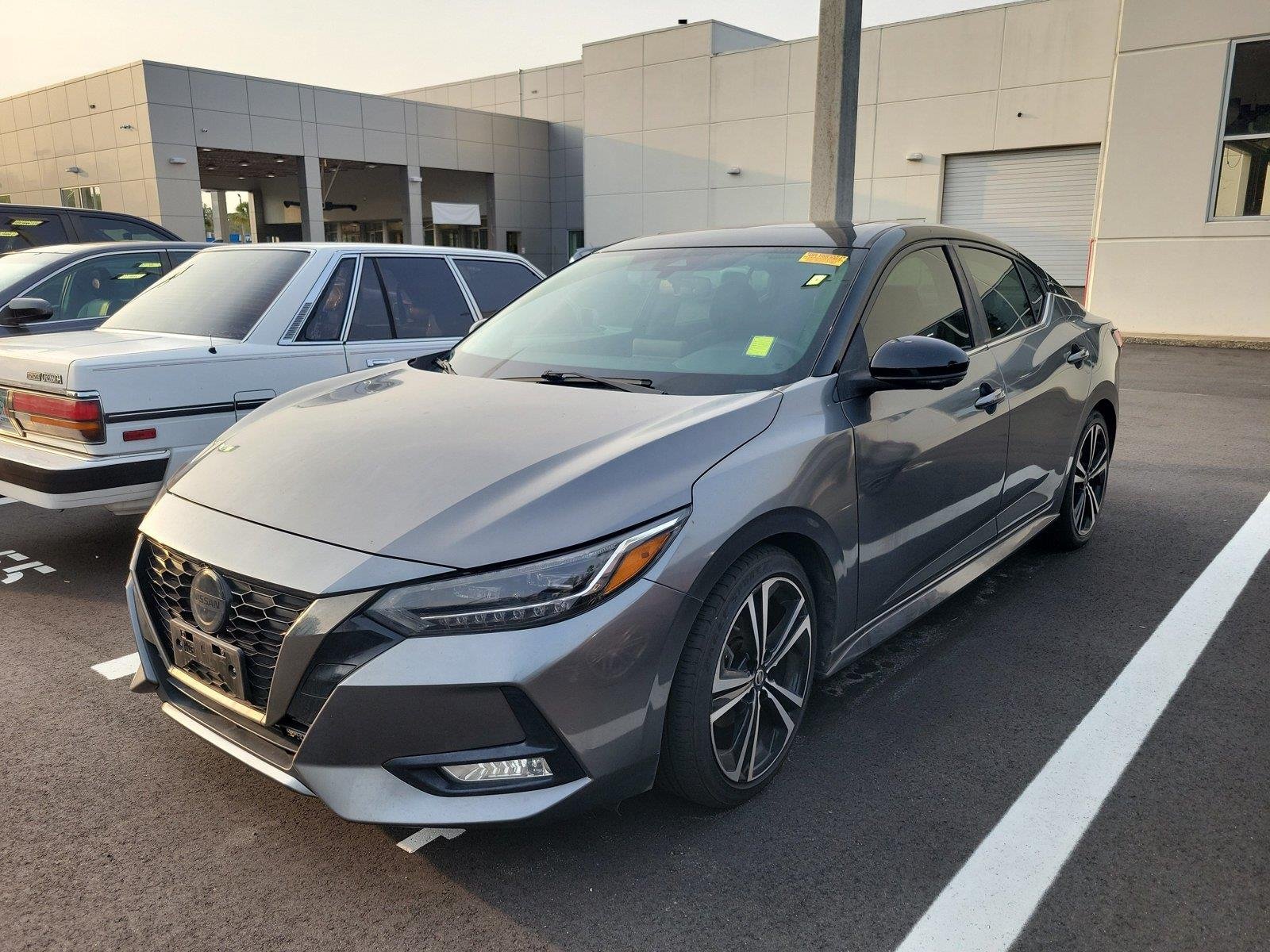 Used 2021 Gun Metallic/Super Black Nissan SR image 1
