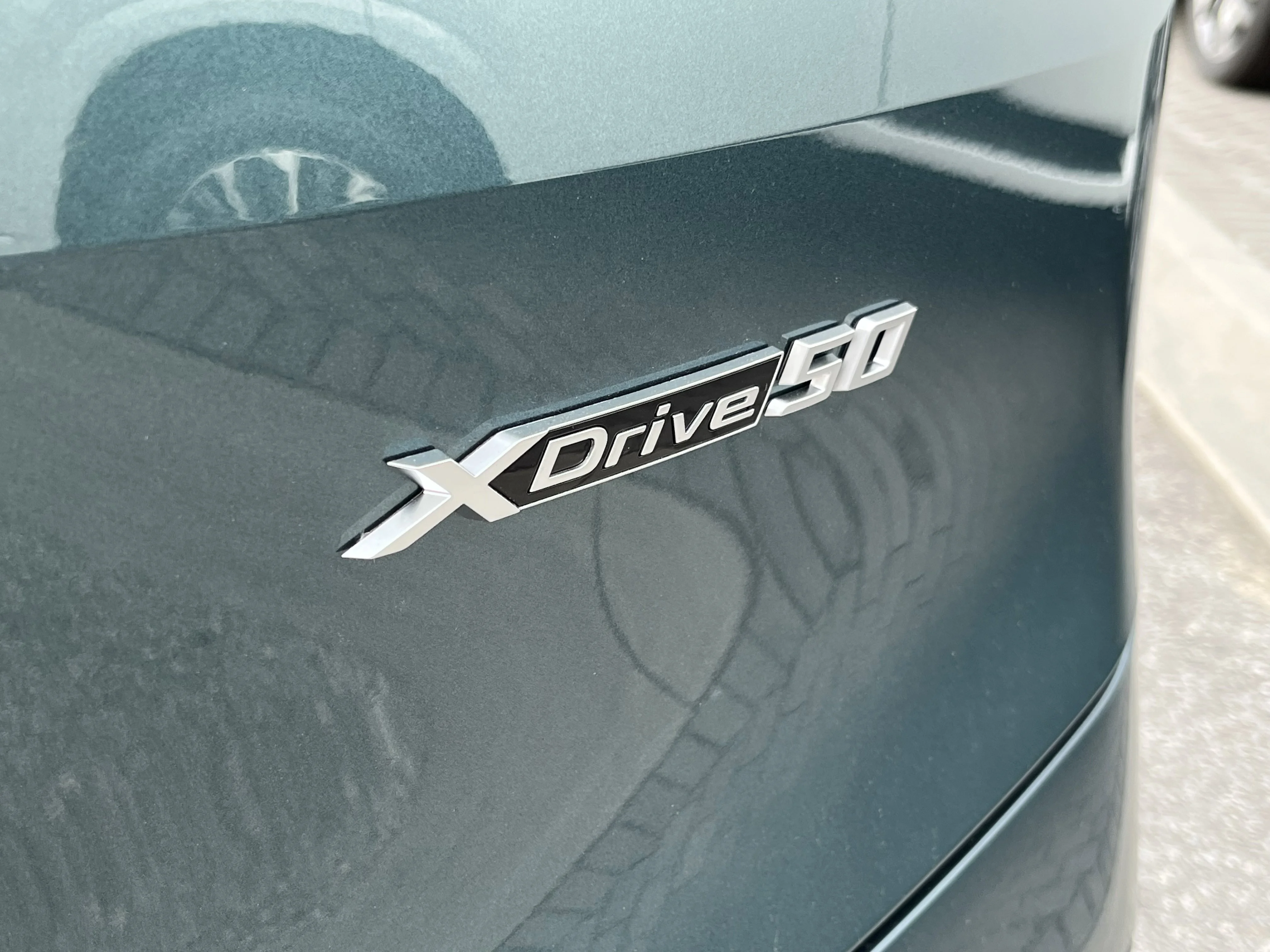 Used 2025 Blue Ridge Mountain Metallic BMW xDrive50 image 9