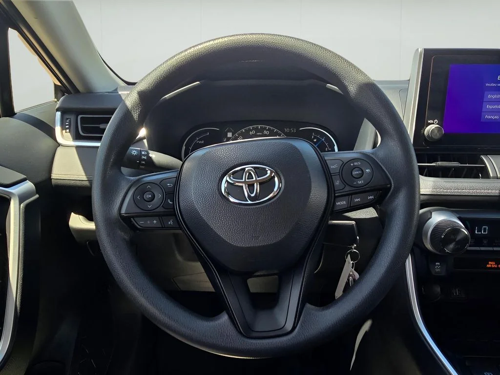Used 2025 Midnight Black Metallic Toyota Hybrid LE image 13