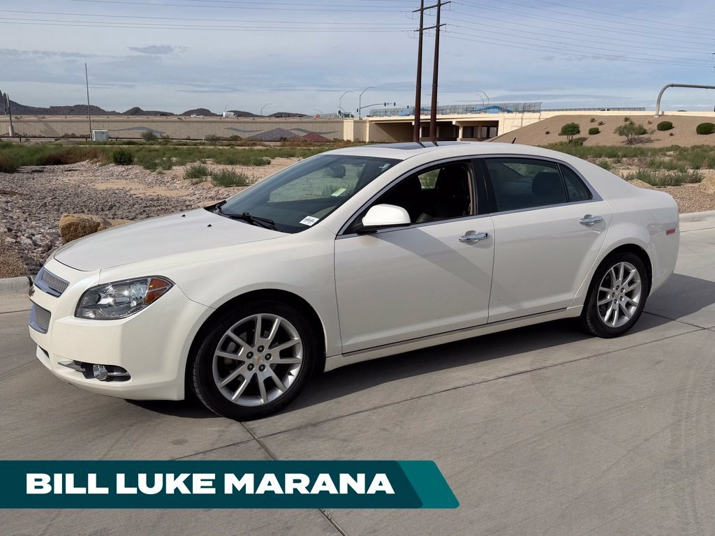 Used 2011 White Chevrolet LTZ image 1
