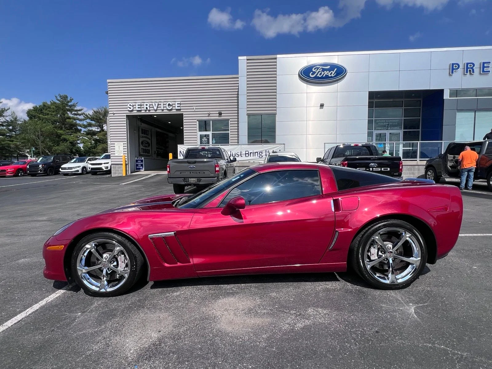 Used 2012 Crystal Red Tintcoat Chevrolet Grand Sport image 6