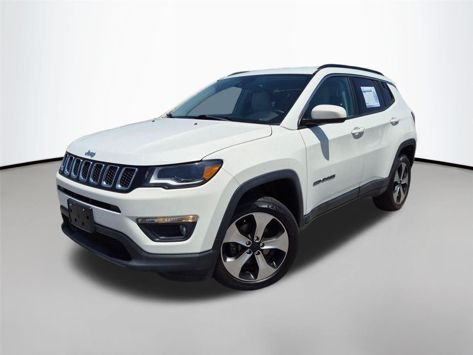 Used 2018 White Clearcoat Jeep Latitude image 1