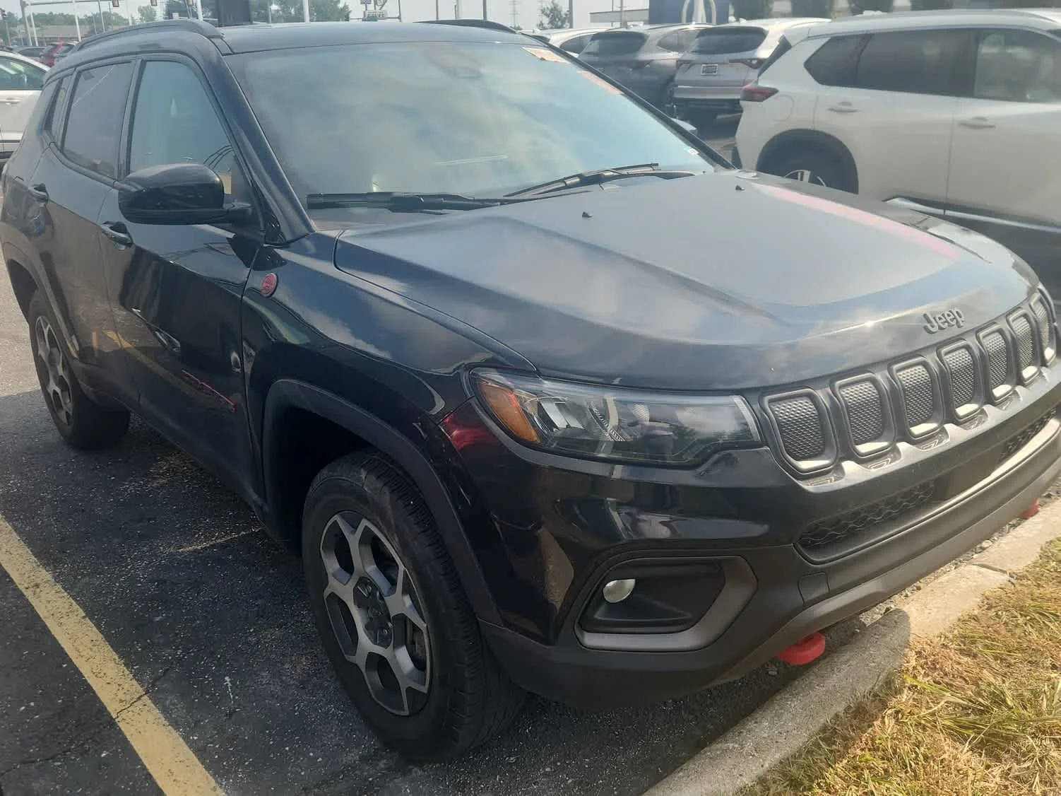 Used 2022 Diamond Black Crystal Pearlcoat Jeep Trailhawk image 3