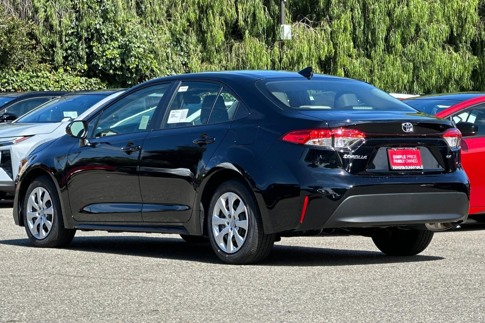 New 2026 Black Toyota LE image 7