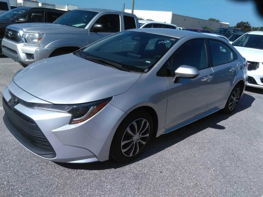 Used 2024 Silver Toyota LE image 1