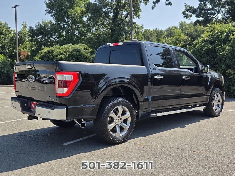 Used 2021 Black Metallic FORD LARIAT 4WD SUPERCREW 5.5