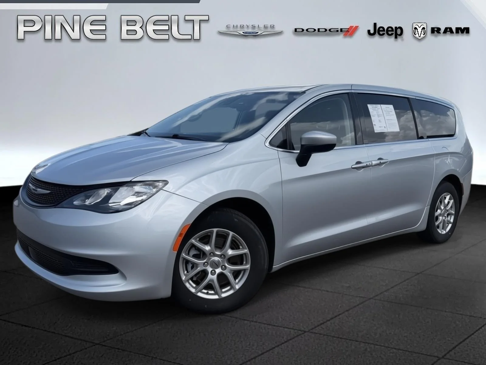 Used 2023 Silver Mist Clearcoat Chrysler LX image 1