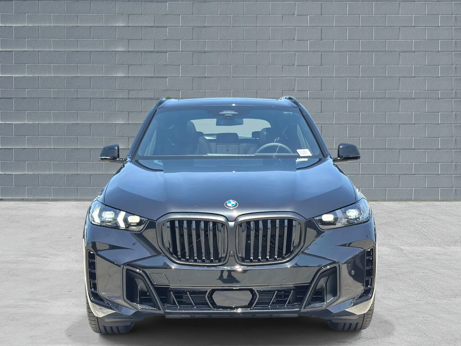 New 2026 Black Sapphire Metallic BMW sDrive40i image 2