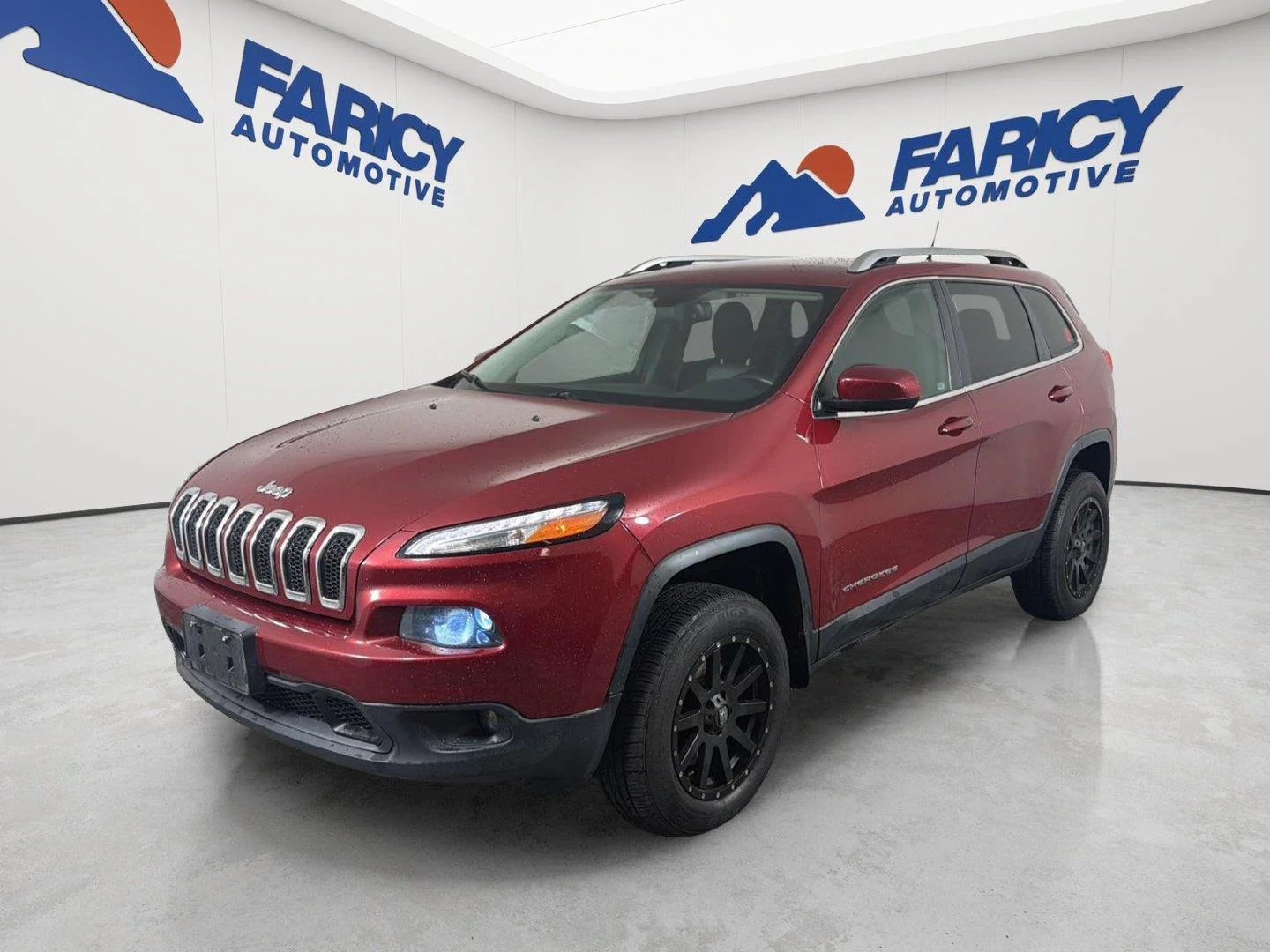 Used 2014 Deep Cherry Red Crystal Pearlcoat Jeep Latitude image 1