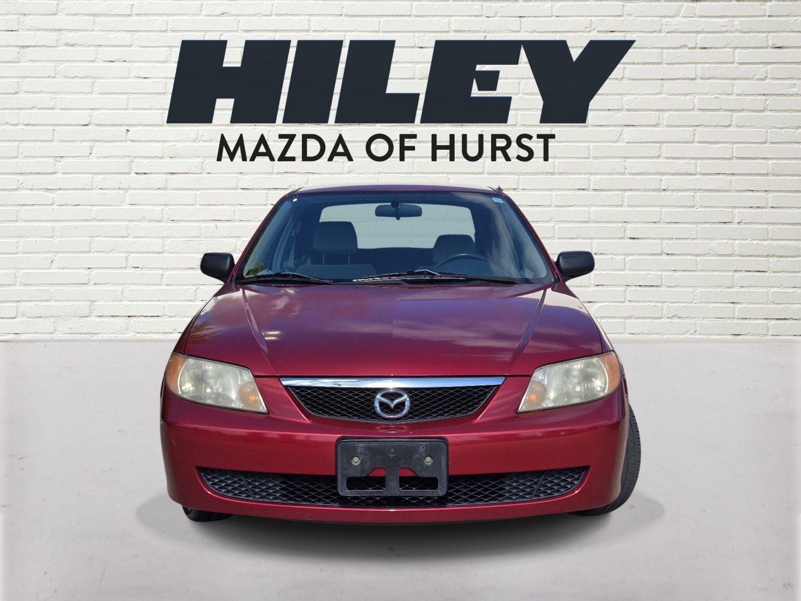 Used 2001 Mazda Protege DX with VIN JM1BJ222710438581 for sale in Hurst, TX