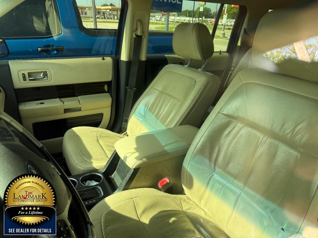 Used 2014 Deep Impact Blue Metallic Ford 4dr SEL AWD image 4