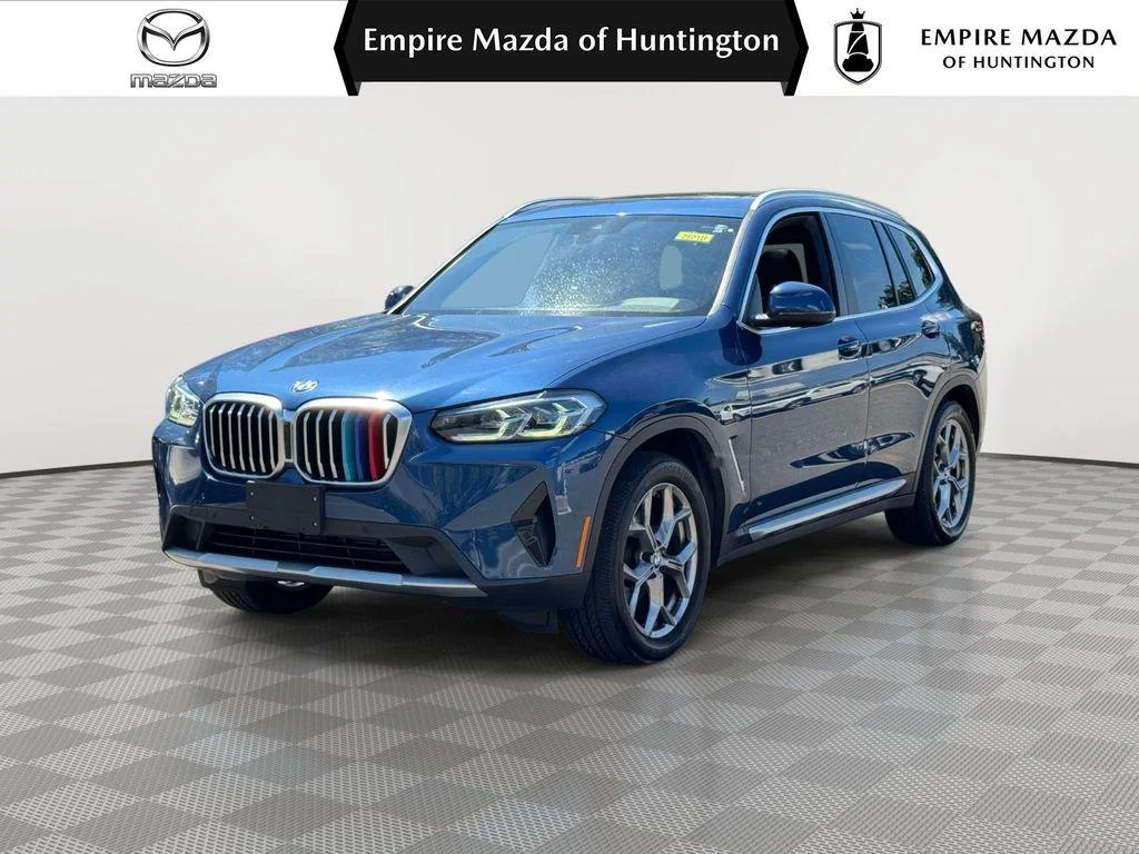 Used 2022 Phytonic Blue Metallic BMW xDrive30i image 1